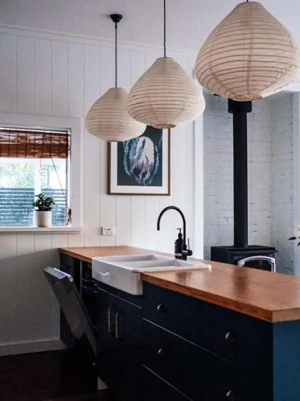 Modular kitchen with island counter and pendant lighting