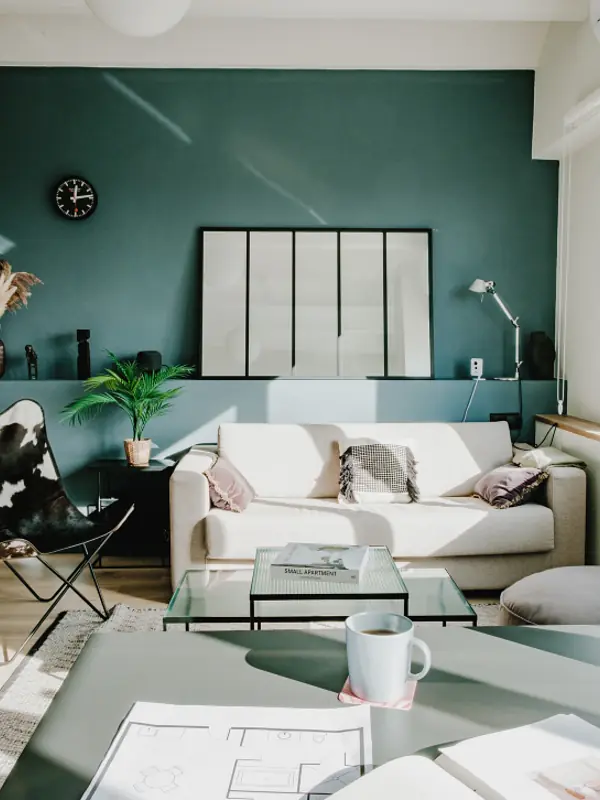Completed turnkey interior living room with green panelled wall